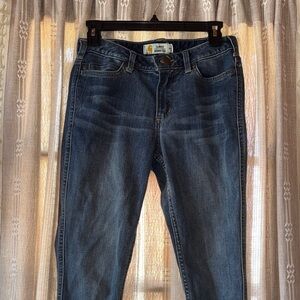 Carhartt Slim Fit Skinny Leg Jeans in Dark Blue with Gold Logo